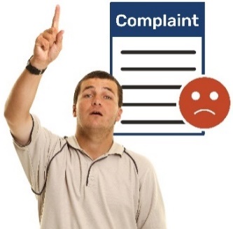 A man raising his hand to say something and a complaint form with a sad face on it. 