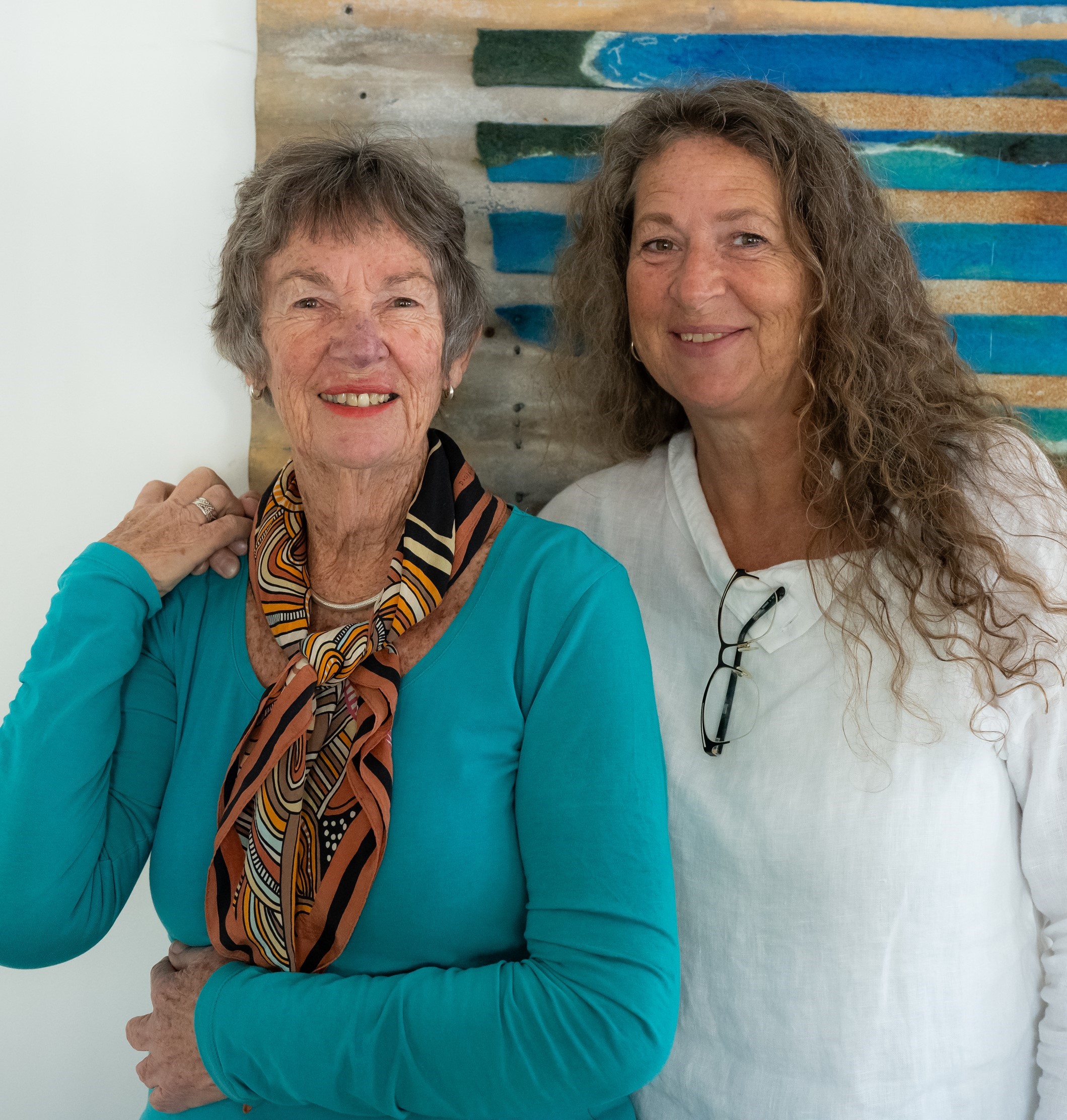 Selfie of two women looking at camera smiling